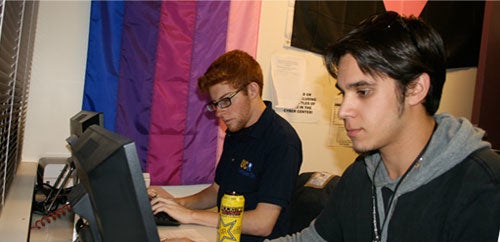 LGBTRC students working on computers.