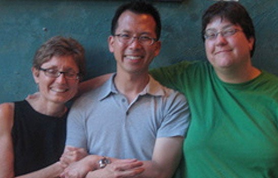 LGBTRC community standing side-by-side.