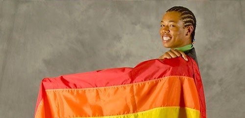 LGBTRC student holding Pride flag.